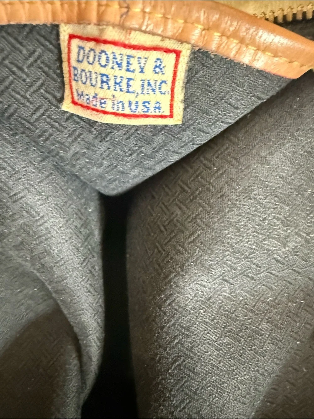 Dooney & Bourke Black Canvas Satchel with Brown Leather Trim